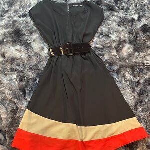 Elegant Black Dress with Red and Cream Accents